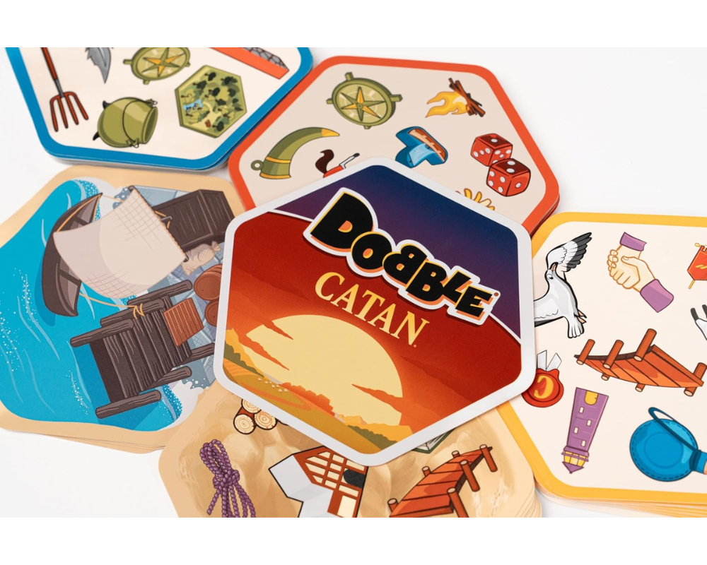 Dobble Catán: Juego de Mesa en Español. Asmodee