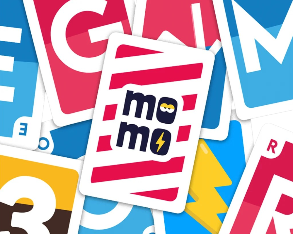 Momo Juego de Mesa en Español. Asmodee